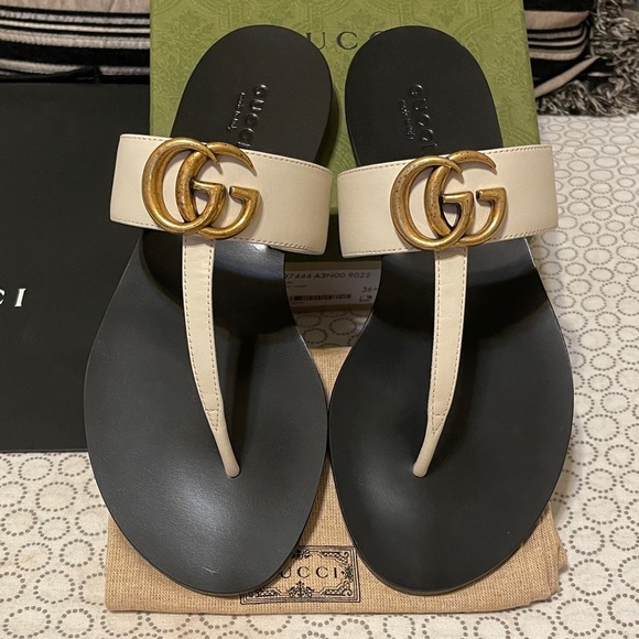 Gucci Shoes - Gucci Cream and Black Sandals with Iconic GG Logo